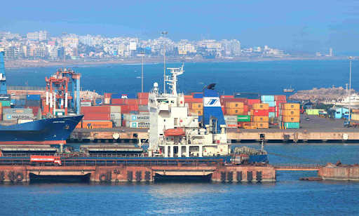 Shivam Shipping India logistics website showing freight forwarding services, warehousing solutions, and cargo tracking interface